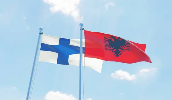 Albania Finlandia Dos Banderas Ondeando Contra Cielo Azul Imagen —  Fotos de Stock