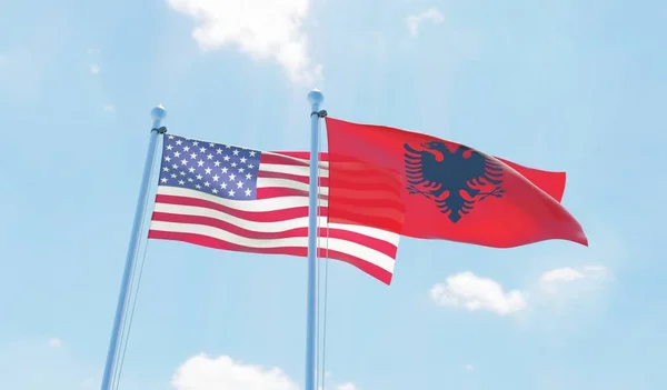 Albania Estados Unidos Dos Banderas Ondeando Contra Cielo Azul Imagen —  Fotos de Stock