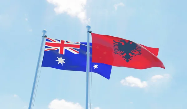 Albania Australia Dos Banderas Ondeando Contra Cielo Azul Imagen —  Fotos de Stock