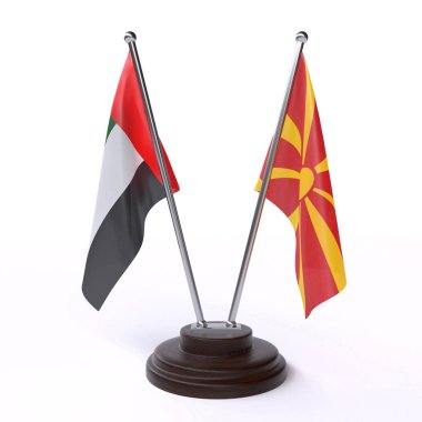 Birleşik Arap Emirlikleri ve Makedonya, iki beyaz arka plan üzerinde izole bayrakları masa. 3D görüntü 