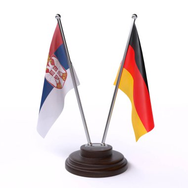Sırbistan ve Almanya, iki beyaz arka plan üzerinde izole bayrakları masa. 3D görüntü
