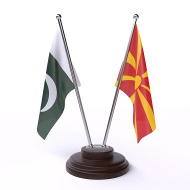 Pakistan ve Makedonya, iki beyaz arka plan üzerinde izole bayrakları masa. 3D görüntü