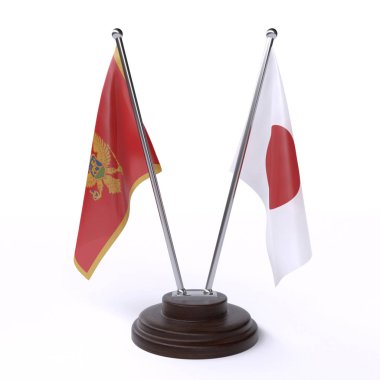 Karadağ ve Japonya, iki beyaz arka plan üzerinde izole bayrakları masa. 3D görüntü