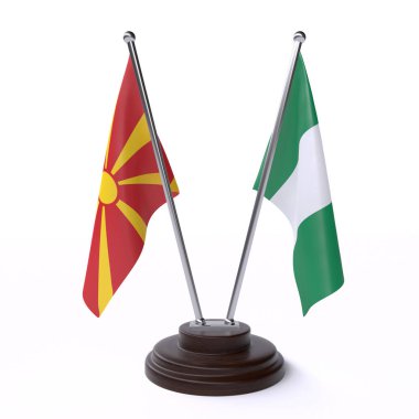 Makedonya ve Nijerya, iki beyaz arka plan üzerinde izole bayrakları masa