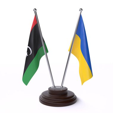 Libya'da ve Ukrayna, iki beyaz arka plan üzerinde izole bayrakları masa