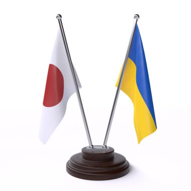 Japonya ve Ukrayna, iki beyaz arka plan üzerinde izole bayrakları masa
