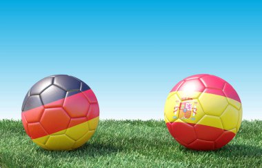 Bayrak renkleri yeşil çimenlerin üzerinde iki futbol topları. Almanya ve İspanya. 3D görüntü