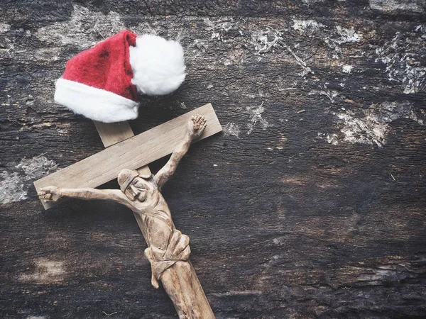 Croce Con Cappello Natale Sfondo Legno — Foto Stock