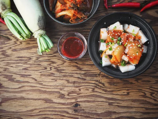 Kimchi radish Korean food background with text space