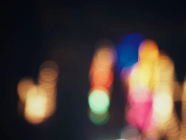 黑色背景或纹理上的 Bokeh — 图库照片