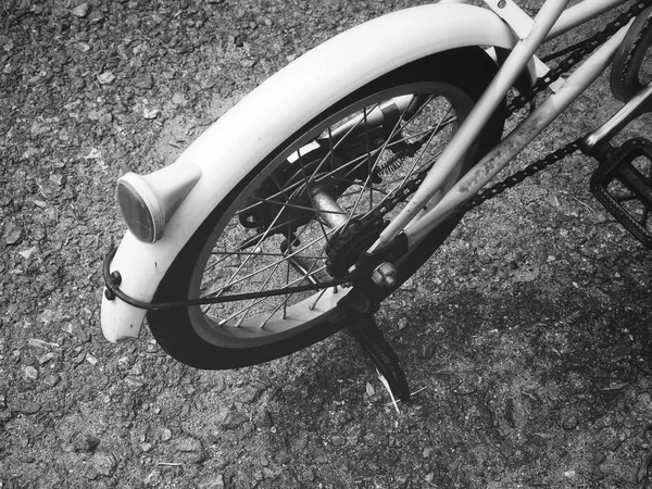 Wheel of bicycle on road — Stock Photo, Image