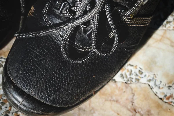 Close up of black safety shoes
