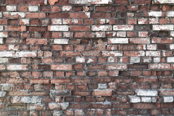 Gerissenes Mauerwerk als Hintergrund. — Stockfoto