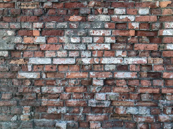 Gerissenes Mauerwerk als Hintergrund. — Stockfoto