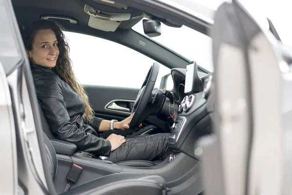 Woman in vehicle interior
