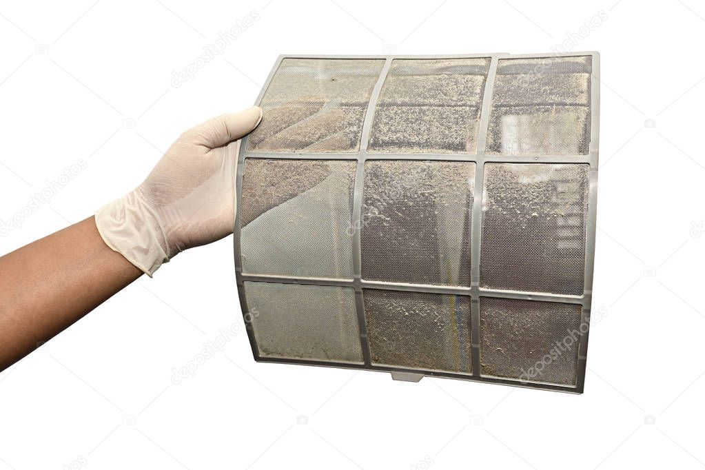 Isolated, Hand take air conditioner filter net with dust. Before cleaning process. Closeup Horizontal color image.