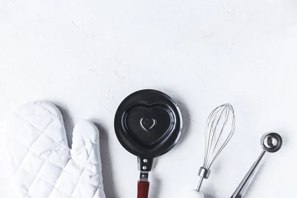 dishes and kitchen accessories for baking on the Kitchen table on a white background Copy space