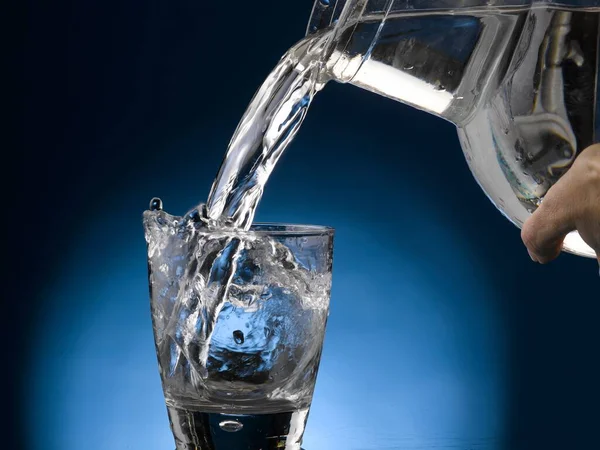 Water being poured from pitcher