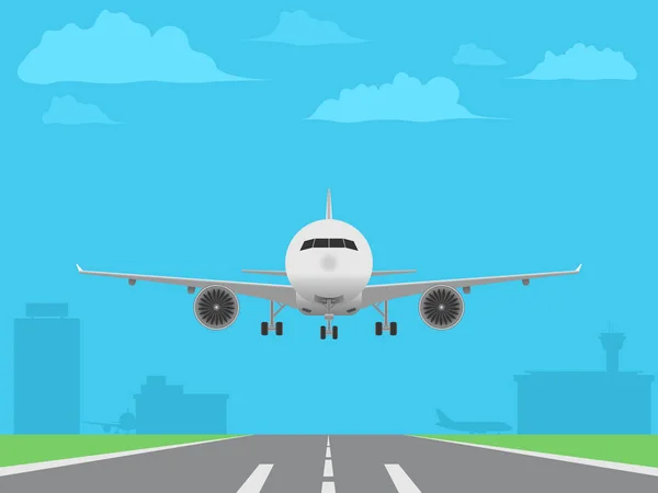 Beyaz uçak piste iniş. Havaalanı binaların arka plan