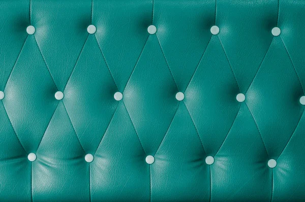 Green leather sofa background — Stock Photo, Image