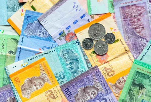 Malaysian ringgit banknotes and coins background. Financial conc — Stock Photo, Image