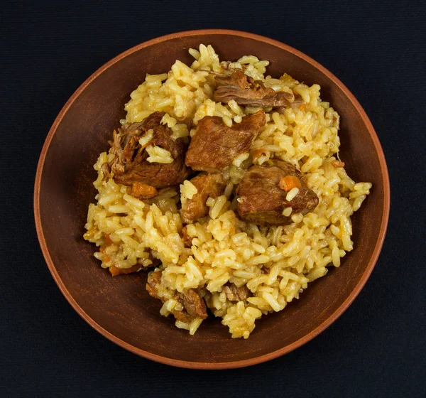 Clay Plate Rice Pilaf Meat Turmeric Black Background — Stock Photo, Image