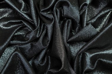 siyah pullu yumuşak kıvrımlar kumaştır