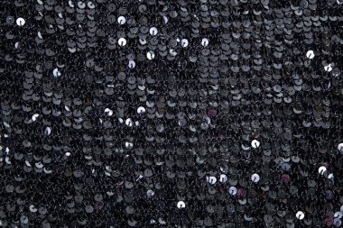 örme olarak yuvarlak siyah pullu kumaş