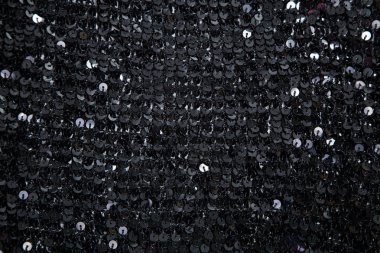 örme olarak yuvarlak siyah pullu kumaş