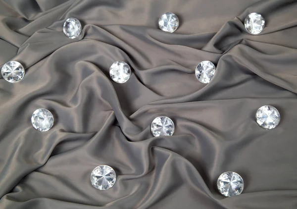 soft gray metallic fabric lined with faux crystals