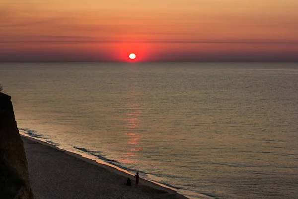 rising sun over the Black Sea, in orange tones