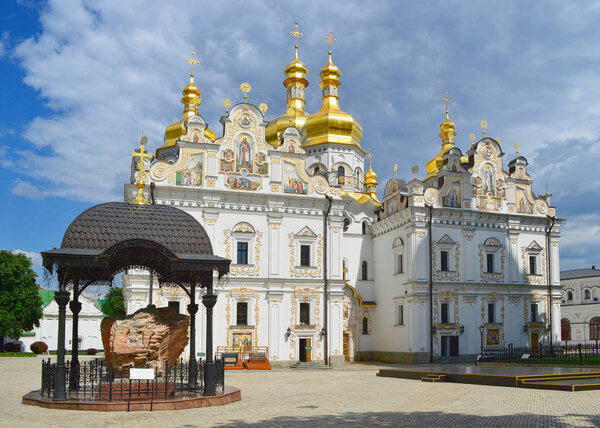 Dormition Cathedral at Kiev Pechersk Lavra, Kiev, Ukraine. Main facade of Dormition church in Kyiv, decorated with gold and paintings