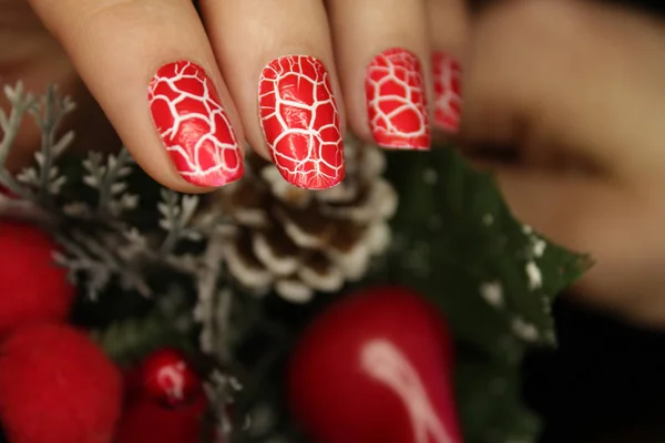 New Year Manicure Christmas Nail Color Red Cracked Color — стоковое фото