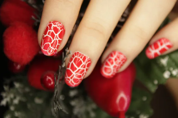 New Year Manicure Christmas Nail Color Red Cracked Color — стоковое фото