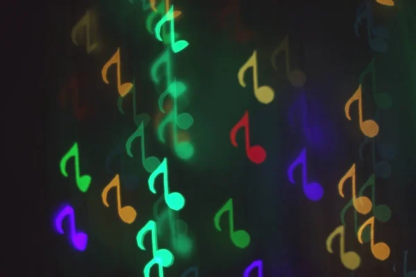 Bokeh Colorido Fundo Escuro Forma Notas Musicais — Fotografia de Stock