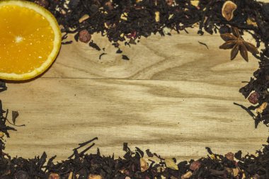 gevşek çay çerçeve ahşap zemin üzerine portakal ile