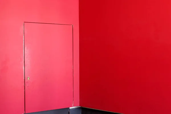 Red wall with red door. This wall located in Hamburg university