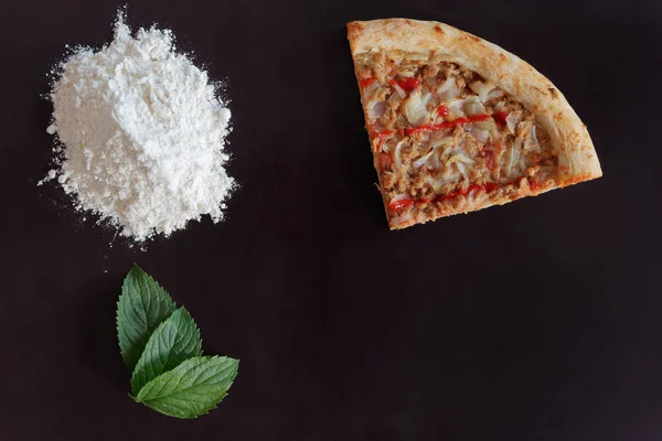 Slice Baked Tuna Pizza Pile Flour Green Leaves Black Background — Stock Photo, Image