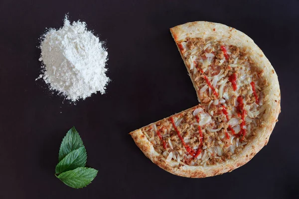 Truncated Pizza Pile Flour Green Leaves Black Background — Stock Photo, Image