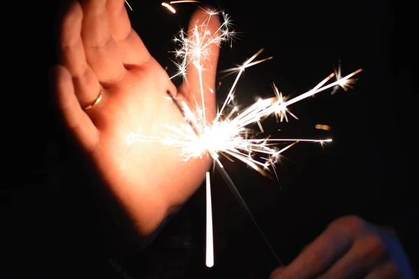 Christmas Sparkle Hands Dark Background — Stock Photo, Image