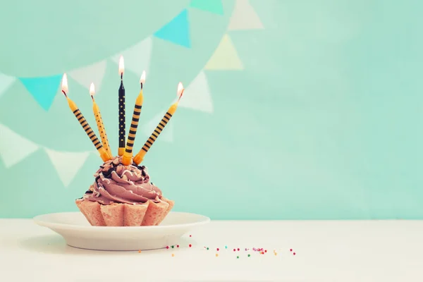 Birthday cake with candles in vintage color, copy space