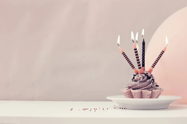 Birthday cake with candles in vintage color, copy space