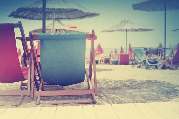 Beach Background Multicolored Deck Chairs Umbrellas Sea — Stock Photo, Image