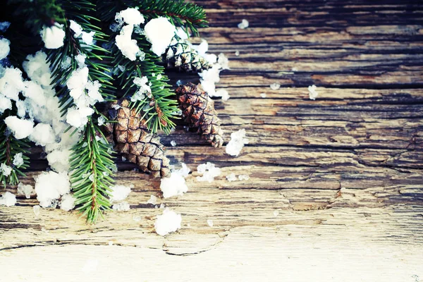 Closeup View Pine Cones Snow Christmas Decorations Wooden Background — Stock Photo, Image