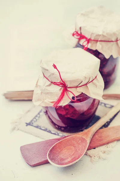 Closeup View Raspberry Jam Cans Wooden Table — Stock Photo, Image