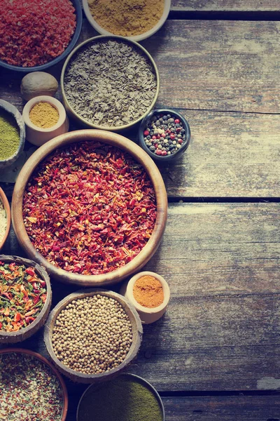 Different Colorful Spices Bowls Wooden Background — Stock Photo, Image