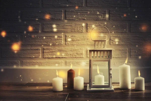 closeup view of candles on floor and christmas decorations in vintage style