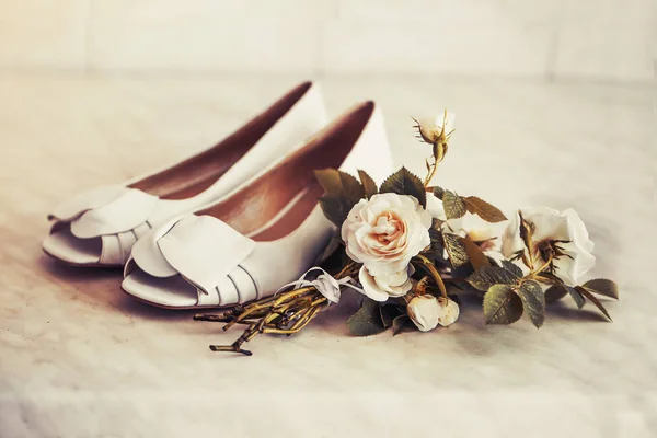 closeup view of vintage shoes and flowers