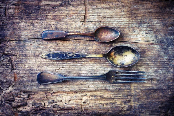 Vintage silverware on wooden background — Stock Photo, Image