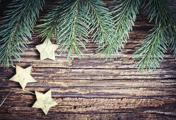 Spar Takken Kerst Decoratieve Sterren Houten Achtergrond — Stockfoto